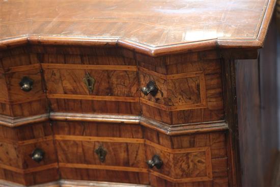 A pair of 18th century Italian walnut commodes, W.2ft 4in. D.1ft 4in. H.2ft 9in.